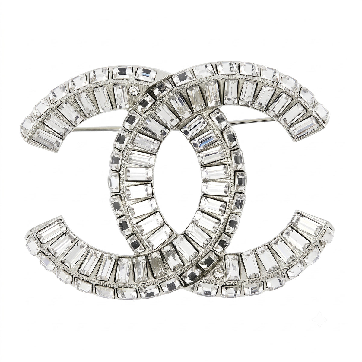 Chanel crystal pin brooch with sparkling gemstone accents and elegant design, shown from the front view.