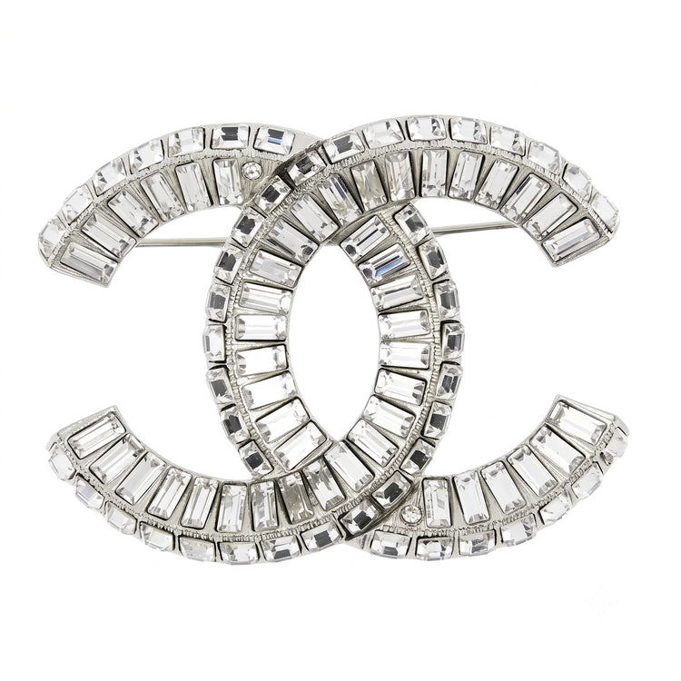 Chanel crystal pin brooch with sparkling gemstone accents and elegant design, shown from the front view.