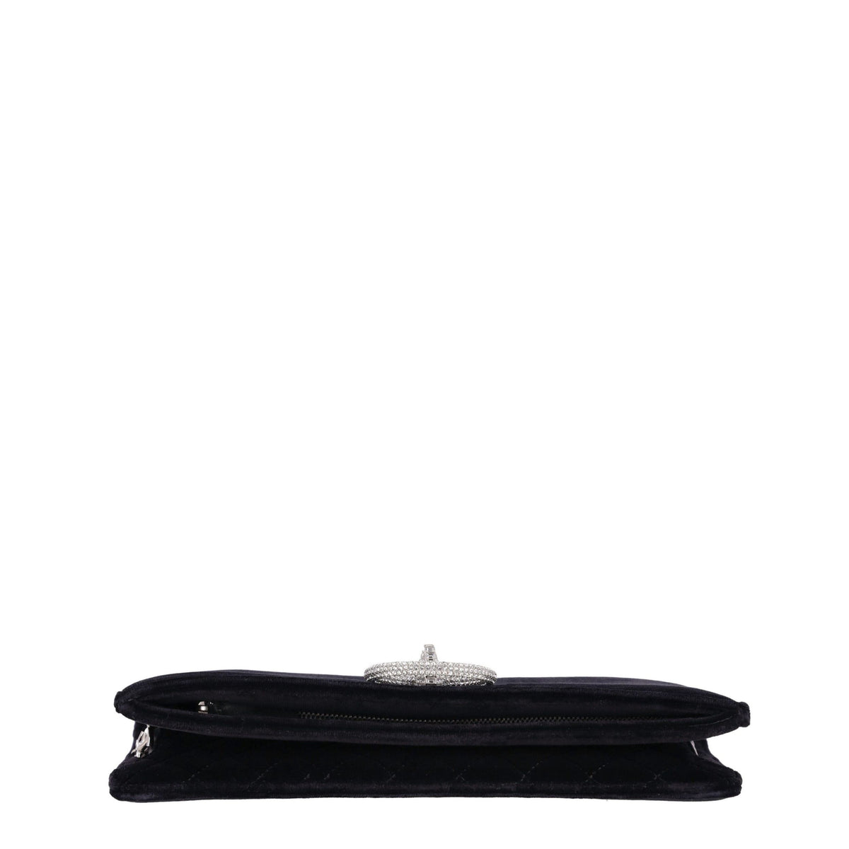 Chanel black velvet clutch shown open with diamond quilted interior