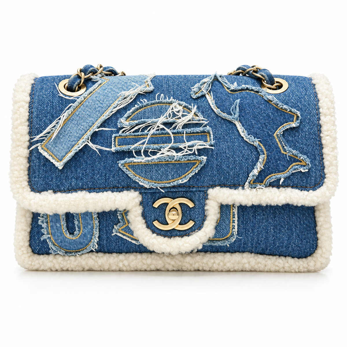 Chanel 2019 medium denim shearling flap shoulder bag with hieroglyph embroidery and flap closure.