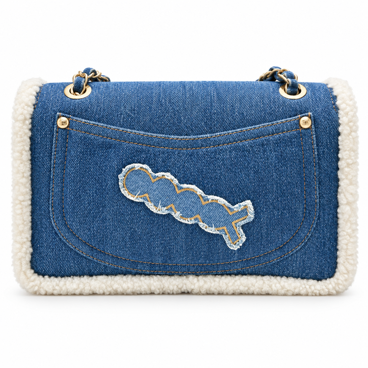 Chanel 2019 medium denim shearling flap bag with hieroglyph embroidery and shoulder strap, stylish and textured accessory.