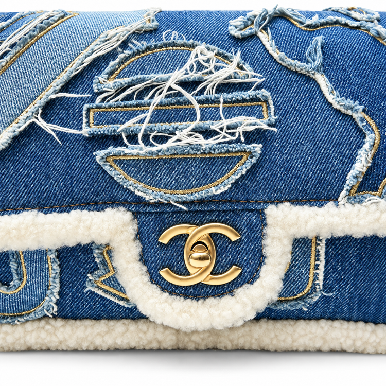Chanel 2019 medium denim shearling flap bag with hieroglyph design, shoulder bag with gold hardware and flap closure.