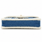 Chanel 2019 medium denim shearling flap shoulder bag with hieroglyph embroidery and signature quilted design.