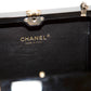 Chanel Gift Box Minaudière clutch, close-up studio shot