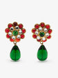 A pair of Chanel Gripoix glass-bead drop earrings, close-up of crystal embellishments featuring a floral cluster top with red, green, and clear rhinestones, and a dangling green teardrop bead below, set against a plain light gray background.