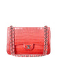 Chanel Jumbo Double Flap Bag in ombré red crocodile leather with silver-tone CC turn-lock closure, double flap silhouette, and interwoven chain-and-leather shoulder straps.