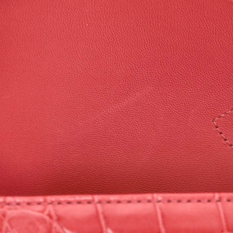 Chanel Jumbo Double Flap Bag in ombré red crocodile leather with silver-tone CC turn-lock closure, double flap silhouette, and interwoven chain-and-leather shoulder straps.