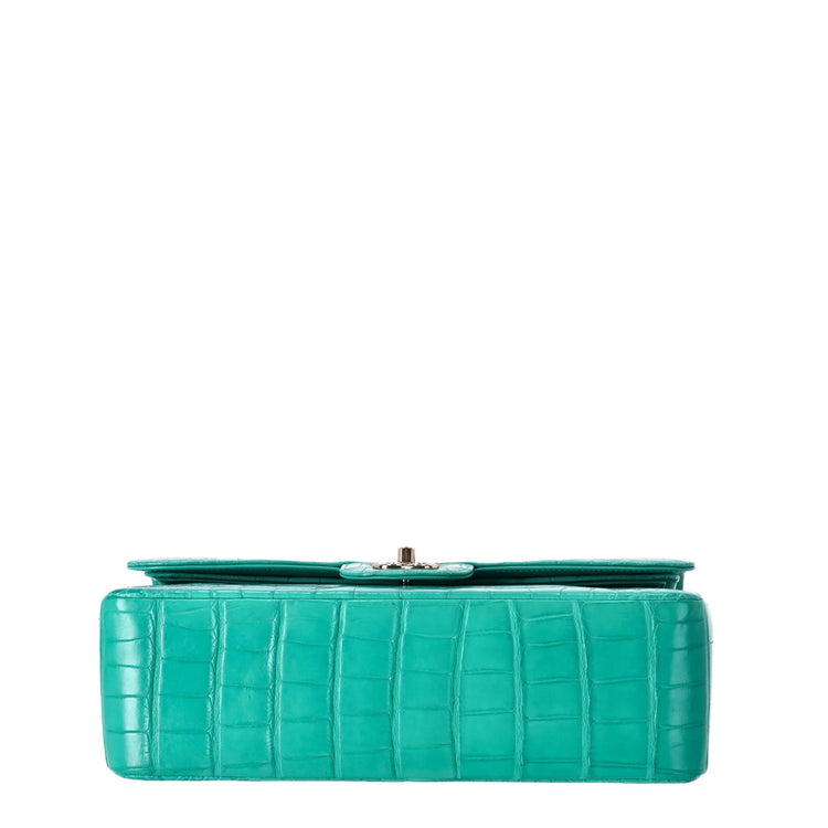 Chanel Jumbo Double Flap Bag in turquoise green exotic leather with silver-tone CC turn-lock closure, double flap silhouette, and interwoven chain-and-leather shoulder straps.