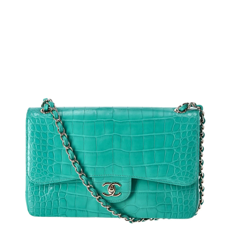 Chanel Jumbo Double Flap Bag in turquoise green exotic leather with silver-tone CC turn-lock closure, double flap silhouette, and interwoven chain-and-leather shoulder straps.