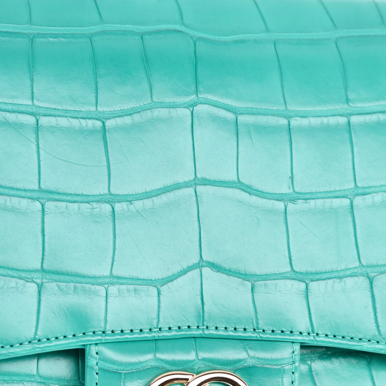Chanel Jumbo Double Flap Bag in turquoise green exotic leather with silver-tone CC turn-lock closure, double flap silhouette, and interwoven chain-and-leather shoulder straps.