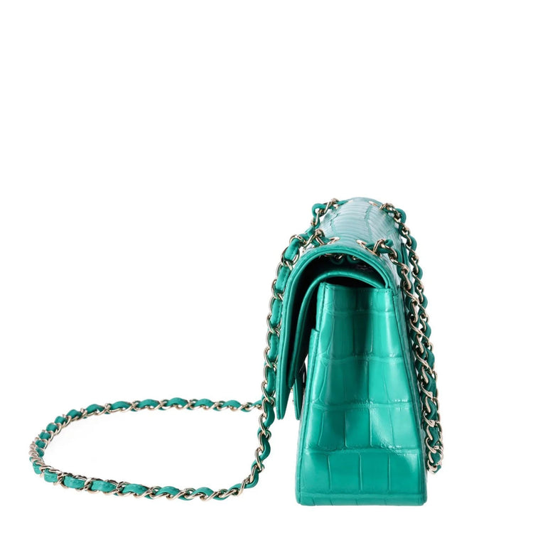 Chanel Jumbo Double Flap Bag in turquoise green exotic leather with silver-tone CC turn-lock closure, double flap silhouette, and interwoven chain-and-leather shoulder straps.