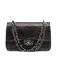 Chanel Jumbo Double Flap Shoulder Bag in classic quilted leather with gold chain strap and signature CC logo.