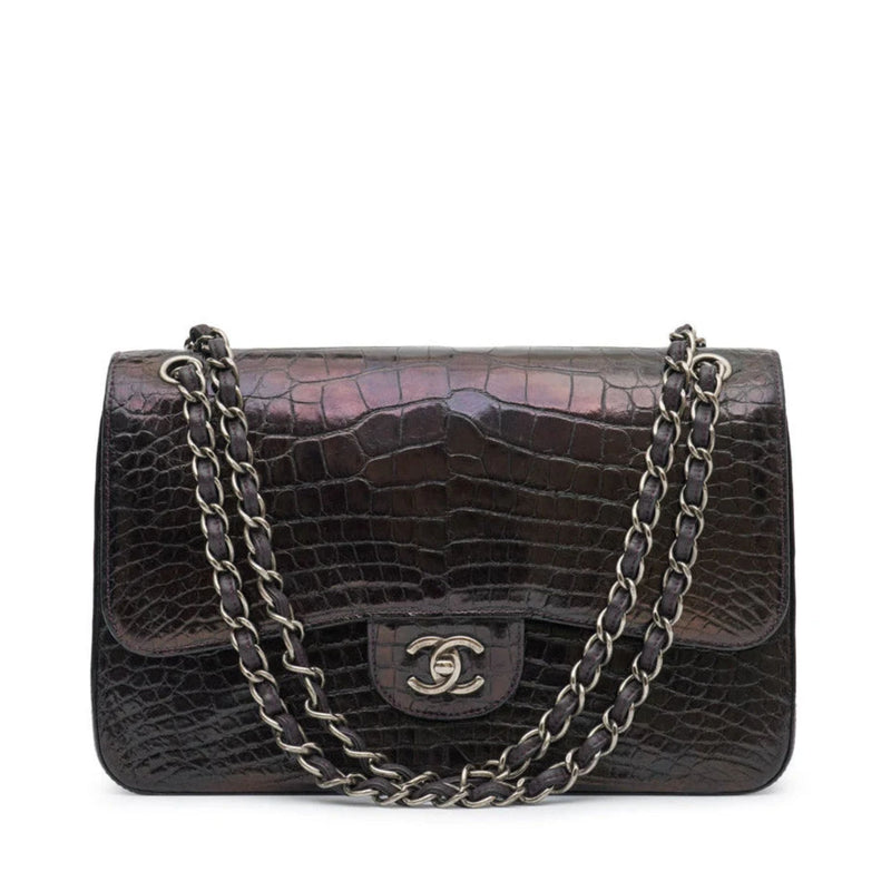 Chanel Jumbo Double Flap Shoulder Bag in classic quilted leather with gold chain strap and signature CC logo.