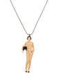 Chanel Keira Knightley doll pendant necklace featuring a detailed doll charm on a sleek chain.