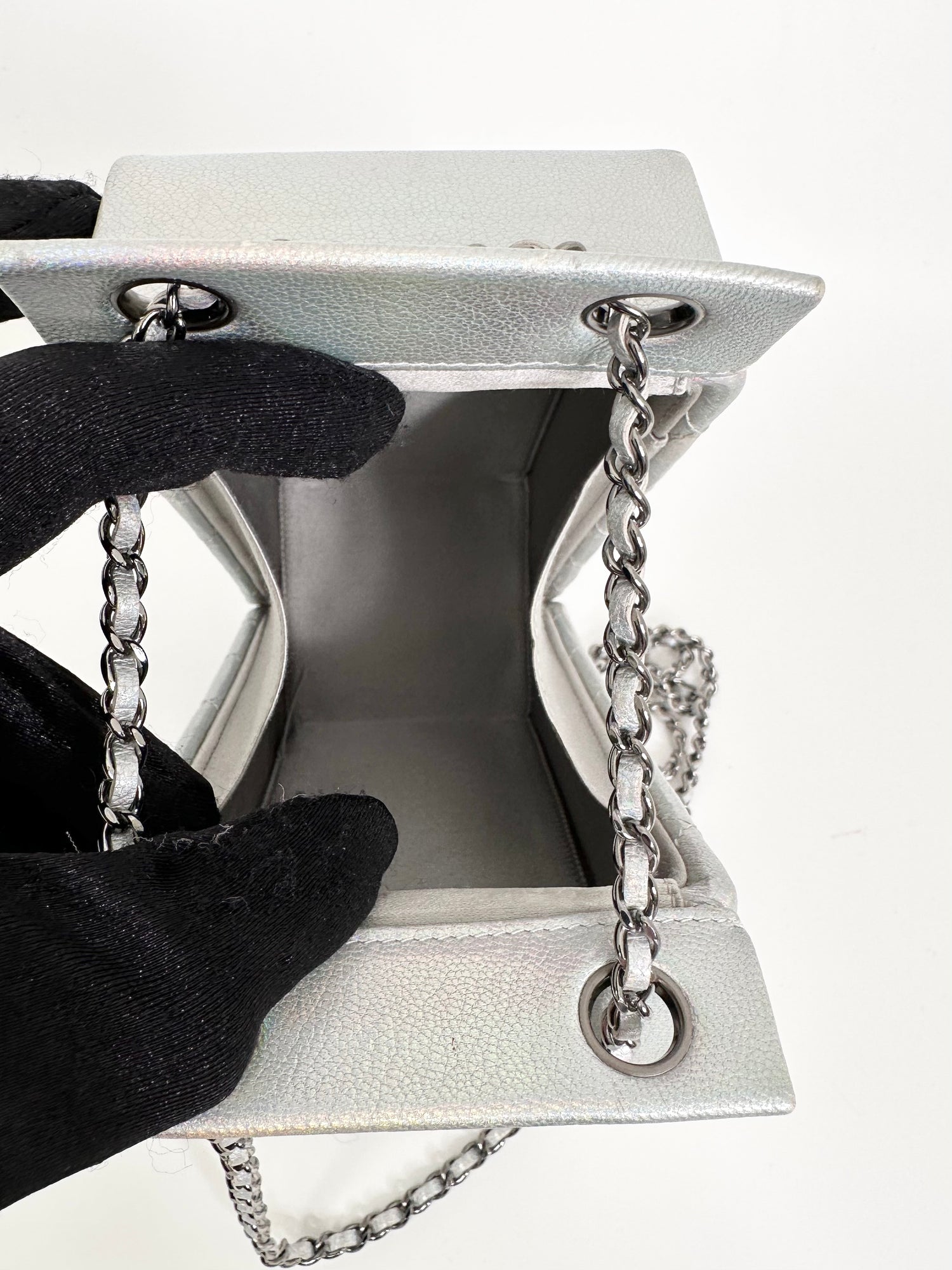 Chanel Lait de Coco bag shown with chain strap extended