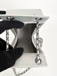 Chanel Lait de Coco bag shown with chain strap extended