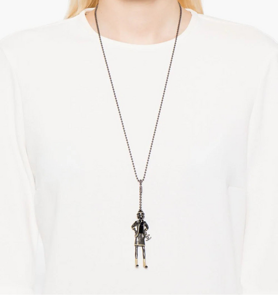 Chanel Mademoiselle Coco beaded necklace with intricate pearl and bead detailing on a delicate chain.