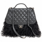 Chanel Paris-Dallas large quilted double flap handbag with fur accents, featuring signature Chanel design and elegant craftsmanship.