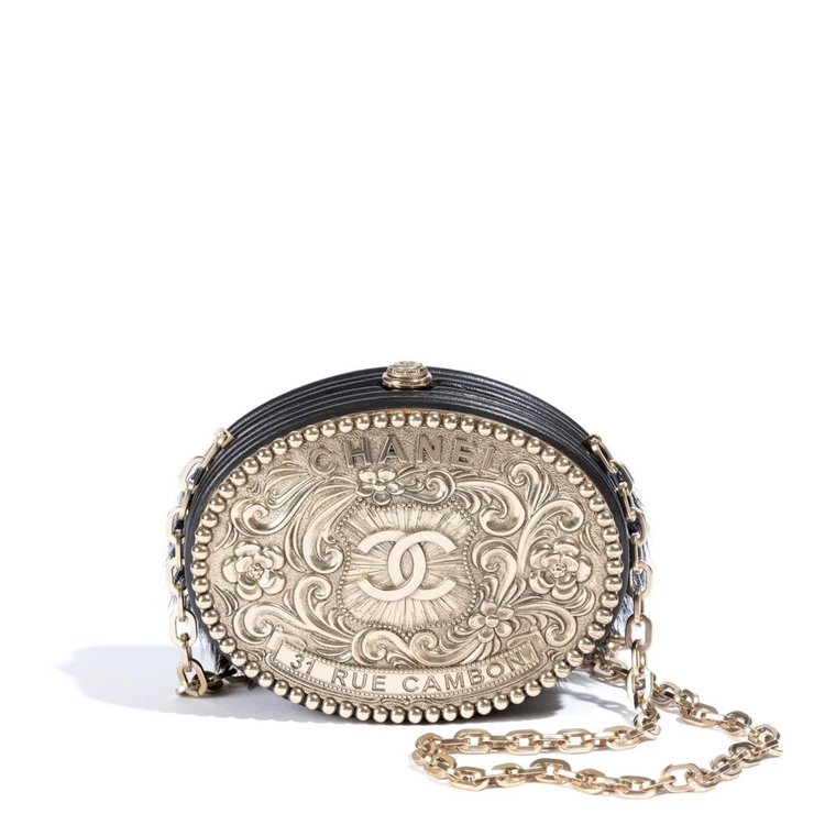 Chanel Paris-Dallas Metiers D’Art belt buckle minaudière clutch bag with intricate detailing and elegant design.