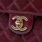Chanel Paris-Edinburgh Caviar Flap Bag in black leather with gold chain strap and signature quilted design, shoulder bag style.