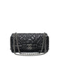 Chanel Paris-Moscow Flap Bag shoulder bag with quilted leather and chain strap, shown from the side view.