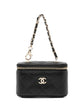 Chanel quilted caviar mini vanity bag charm with gold-tone hardware, featuring a compact, elegant accessory for handbags.
