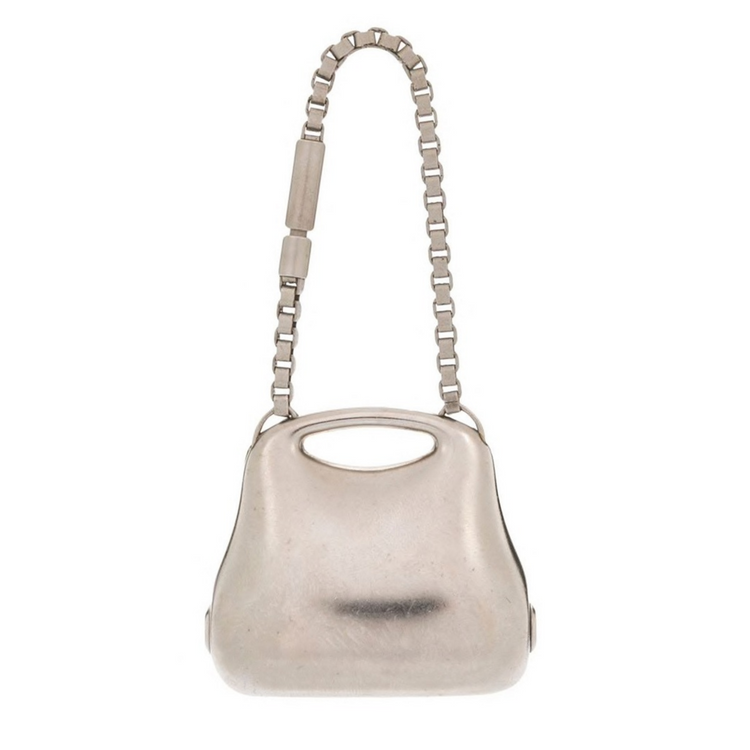 Silver Millennium Bag Charm by Chanel featuring a detailed moon and star motif, perfect as a small accessory.