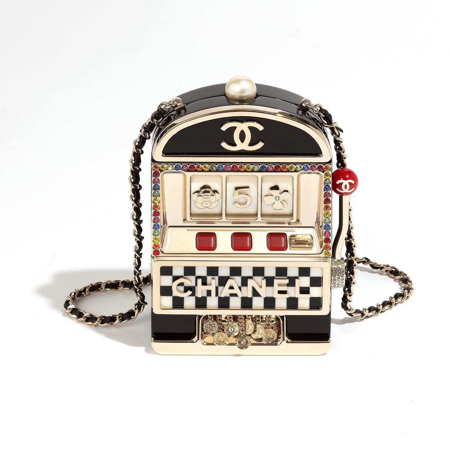Chanel Slot Machine Casino Minaudière Clutch with black, cream and gold-tone slot machine design, CC logos, pearl-style top detail, rainbow crystal trim, checkerboard Chanel lettering, decorative lever and coin accents.