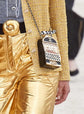 Chanel Slot Machine Casino Minaudière Clutch with black, cream and gold-tone slot machine design, CC logos, pearl-style top detail, rainbow crystal trim, checkerboard Chanel lettering, decorative lever and coin accents.