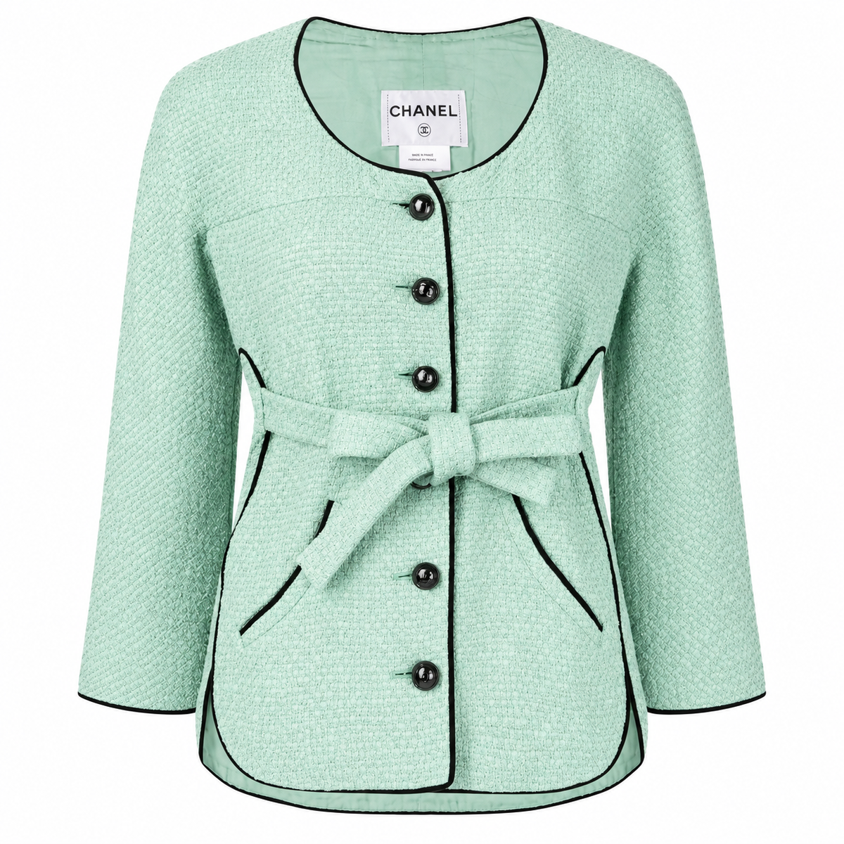 Mint green tweed Chanel jacket with belted waist, classic blazer style, and textured fabric from the 2012 spring collection.