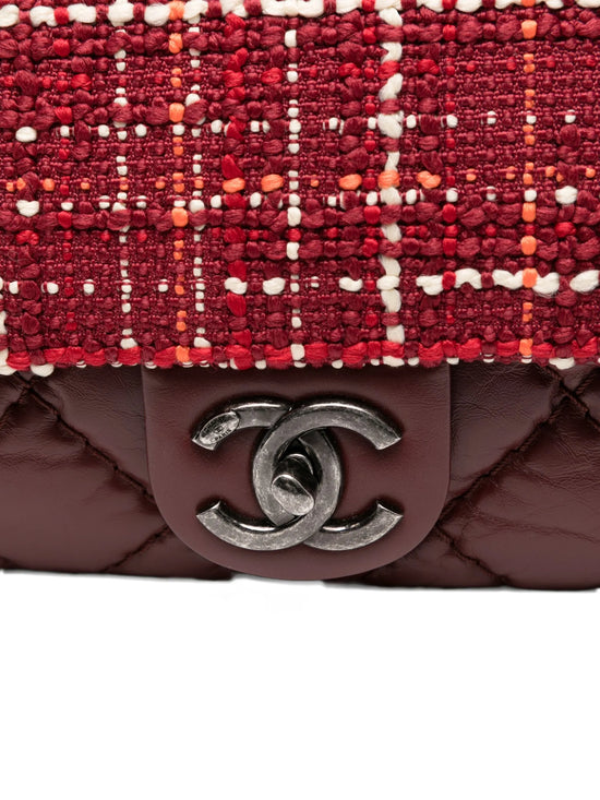 Chanel Tweed Airlines Single Flap Bag, detail of the tweed panel and chain strap
