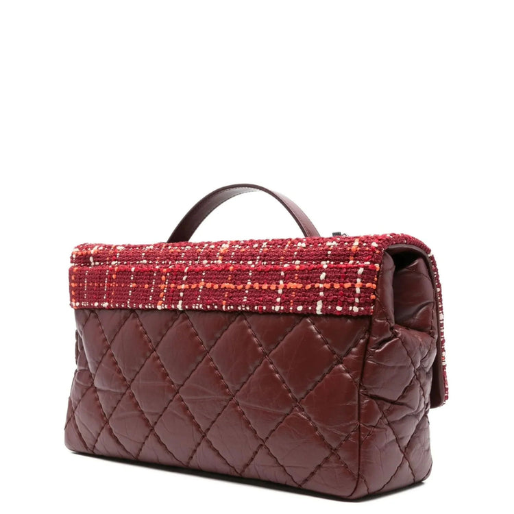 Chanel Tweed Airlines single flap shoulder bag with chain strap and classic woven tweed fabric.