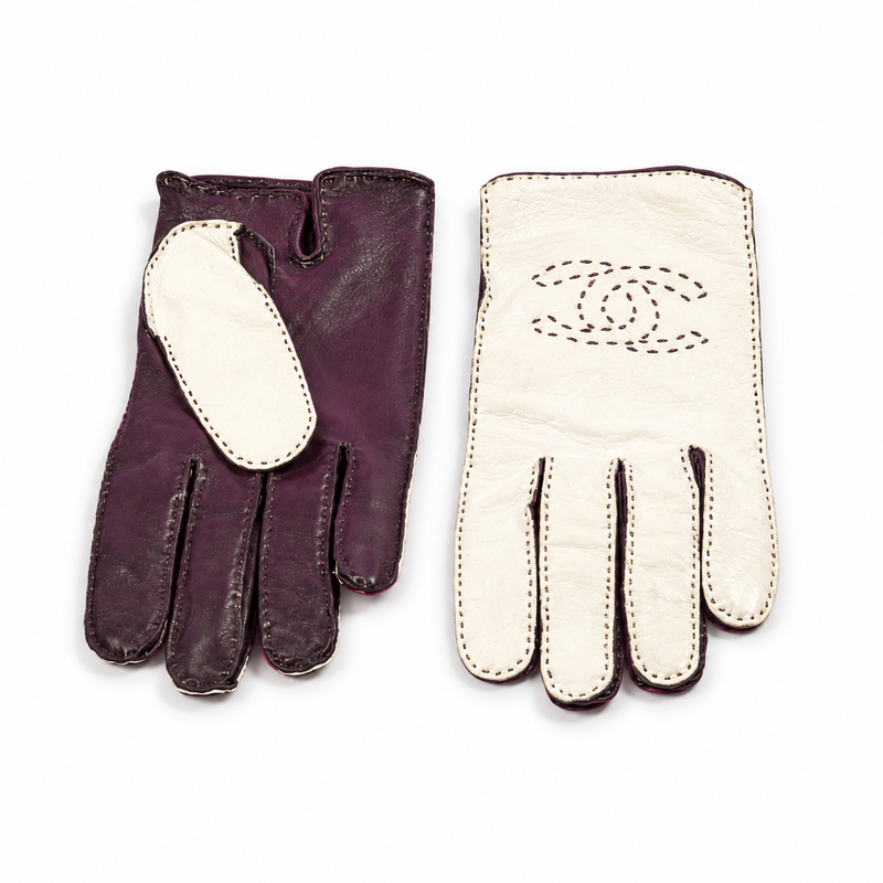 Chanel by Karl Lagerfeld black lambskin and ivory patent leather gloves with perforated CC logo, contrast stitching and size 7.5.