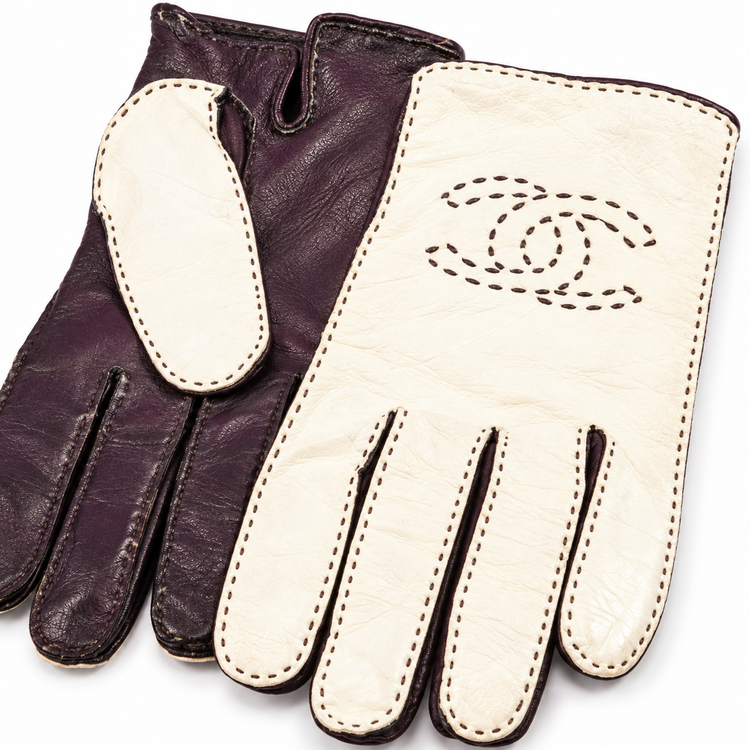 Chanel by Karl Lagerfeld black lambskin and ivory patent leather gloves with perforated CC logo, contrast stitching and size 7.5