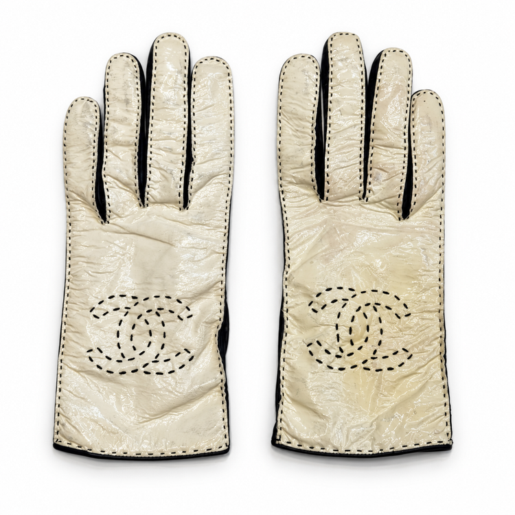 Chanel two-tone CC gloves featuring the iconic CC logo and stylish design