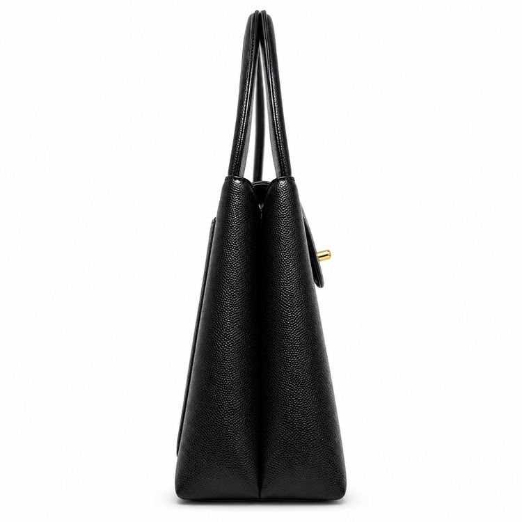 Chanel Vintage Kelly Bag from 1997–1999 in black caviar leather with 24K gold-plated CC hardware and structured double top handles.