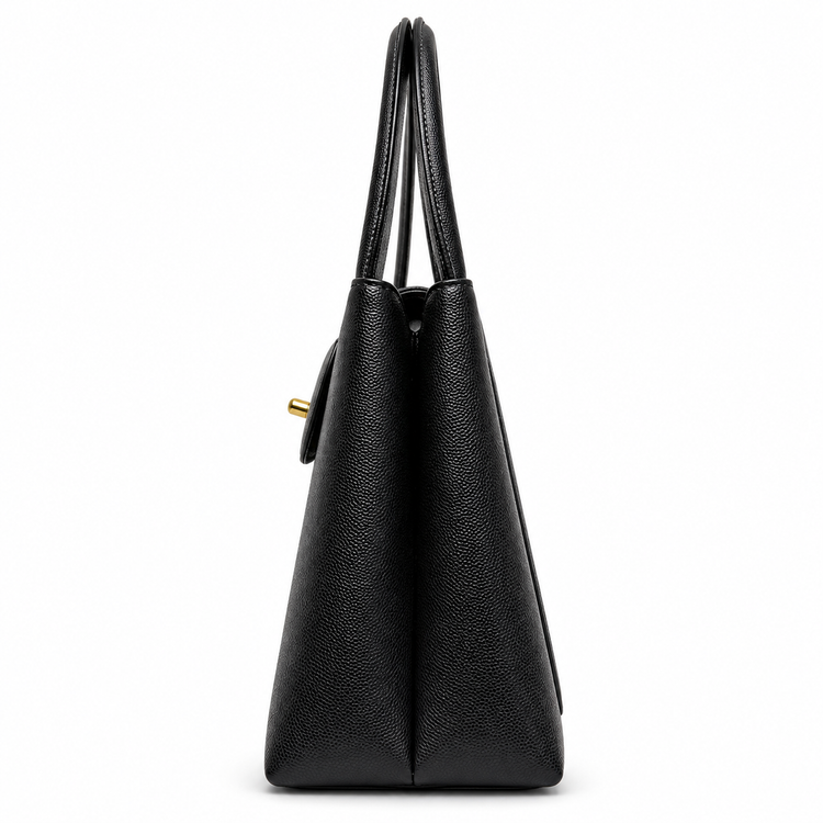 Chanel Vintage Kelly Bag from 1997–1999 in black caviar leather with 24K gold-plated CC hardware and structured double top handles.