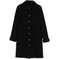 Chanel wool tweed coat with classic pattern, tailored fit, and elegant collar, displayed on a hanger.