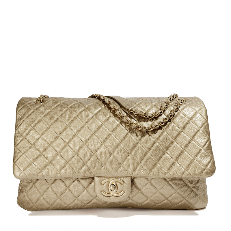 Metallic gold Chanel XXL airline travel flap bag with shoulder strap, stylish and spacious travel accessory.