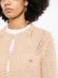 Beige Chanel crochet knit cardigan, stylish tops with intricate knit pattern and classic design, perfect for layered fashion.