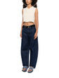 Beige Chanel cropped collared vest with tailored fit and button details, styled as a chic tops piece.