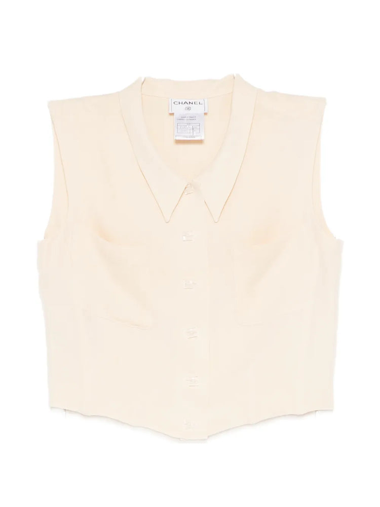 Beige Chanel cropped collared vest, front view, stylish sleeveless top with a tailored collar and clean design.