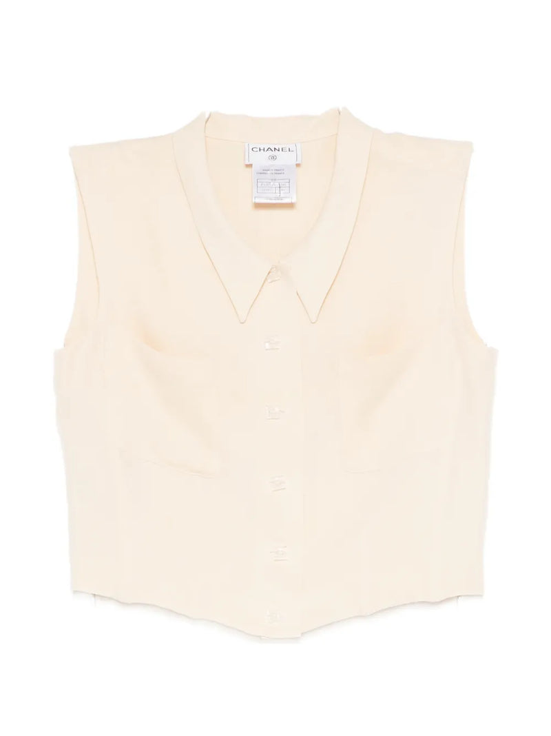 Beige Chanel cropped collared vest, front view, stylish sleeveless top with a tailored collar and clean design.