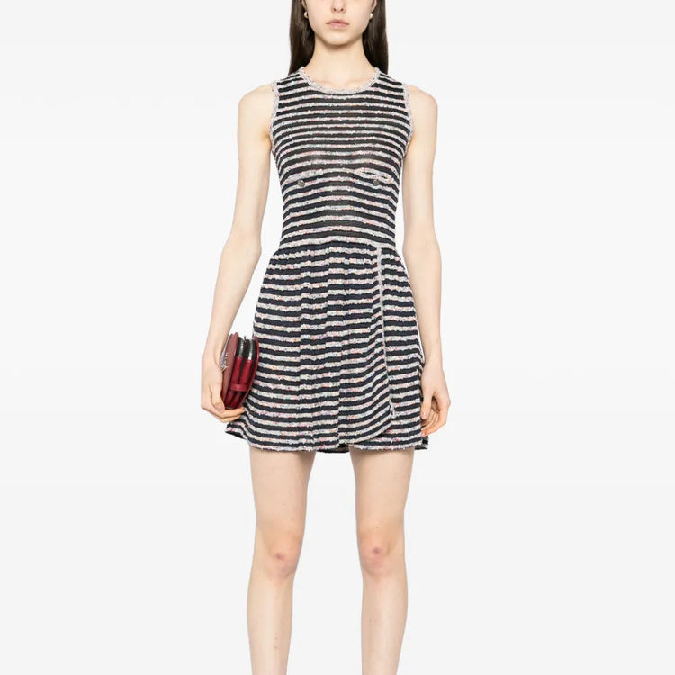 Chanel multicolour sleeveless striped dress featuring bold horizontal stripes and a fitted silhouette, displayed on a mannequin.