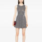 Chanel multicolour sleeveless striped dress featuring bold horizontal stripes and a fitted silhouette, displayed on a mannequin.