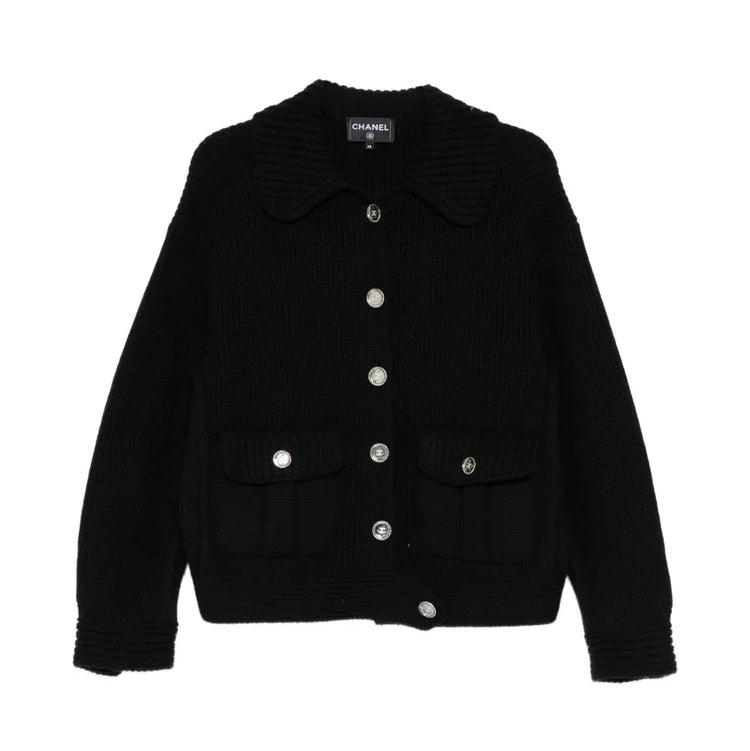 Pre-owned CHANEL cashmere knit cardigan, soft beige color, featuring a classic button-up design and ribbed cuffs.