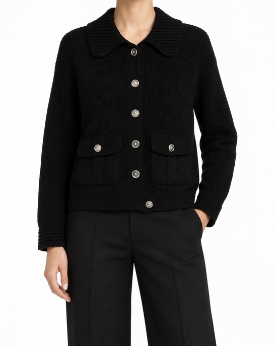 Side view of Chanel black cashmere knit cardigan, a stylish women&