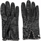 Chanel black leather gloves with tonal abstract pattern, silver-tone leather-woven chain trim and interlocking CC logo detail.