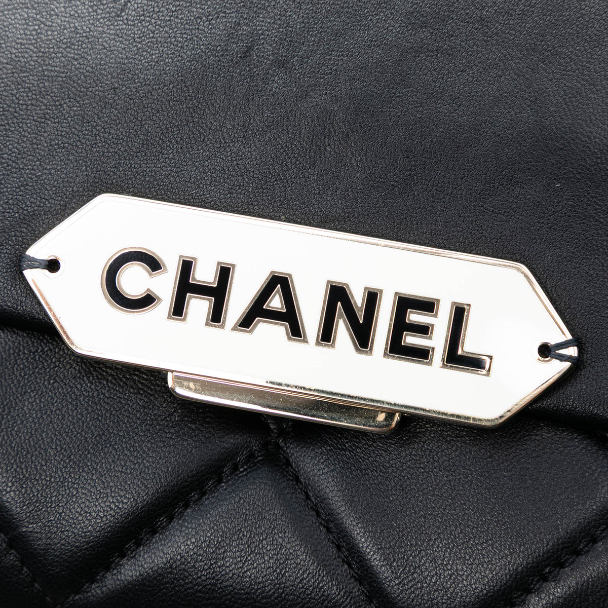 Chanel quilted lambskin retro clutch bag with gold-tone chain strap and classic quilting pattern.