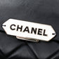 Chanel quilted lambskin retro clutch bag with gold-tone chain strap and classic quilting pattern.